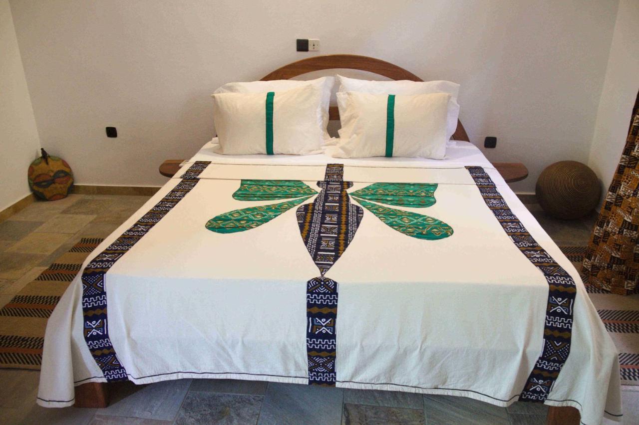 Hotel Otsunami Ломе Экстерьер фото